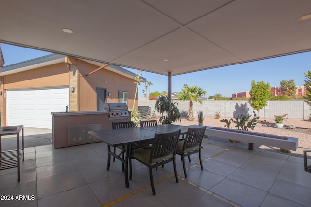 view of patio / terrace with area for grilling and exterior kitchen