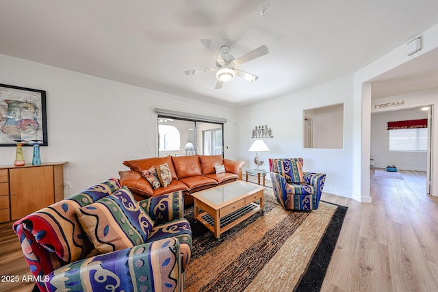 15225 N 100th St Unit 1185, Scottsdale, AZ 85260 - living room with light wood finished floors and a ceiling fan
