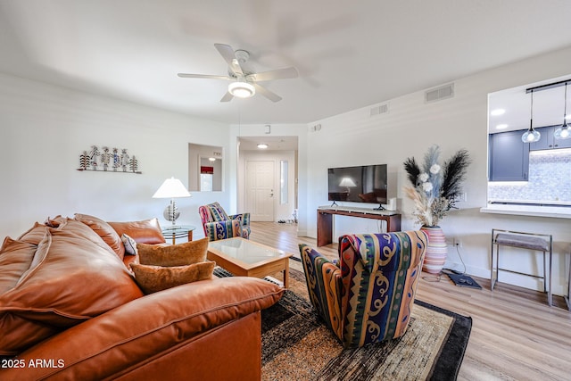 15225 N 100th St Unit 1185, Scottsdale, AZ 85260 - living room with light wood-type flooring and ceiling fan