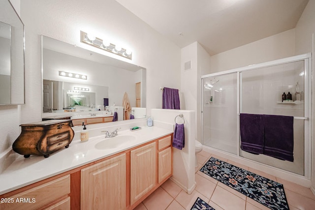 15225 N 100th St Unit 1185, Scottsdale, AZ 85260 - bathroom featuring tile patterned floors, a stall shower, and vanity