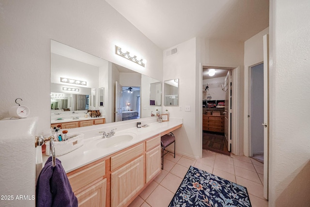 15225 N 100th St Unit 1185, Scottsdale, AZ 85260 - full bathroom featuring tile patterned floors, vanity, and a walk in closet