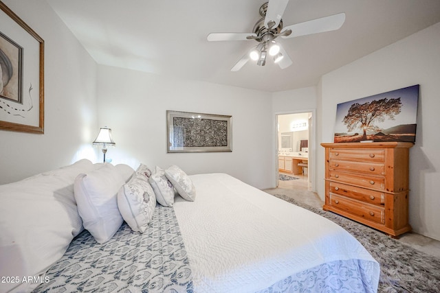 15225 N 100th St Unit 1185, Scottsdale, AZ 85260 - bedroom with light colored carpet, ensuite bath, and ceiling fan