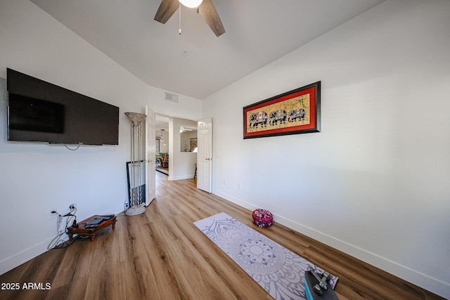 15225 N 100th St Unit 1185, Scottsdale, AZ 85260 - unfurnished living room featuring ceiling fan and wood finished floors