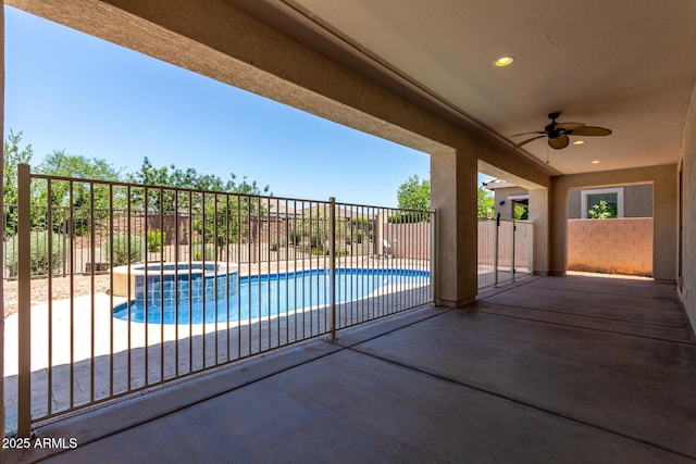 3796 E Rakestraw Ln, Gilbert, AZ 85298 - view of pool with ceiling fan, a fenced backyard, a patio area, and a pool with connected hot tub