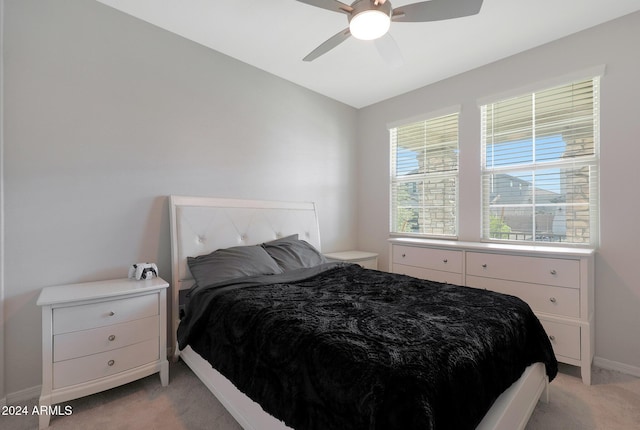 15072 W Mckinley St, Goodyear, AZ 85338 - bedroom with light colored carpet, ceiling fan, and baseboards