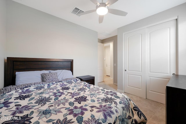15072 W Mckinley St, Goodyear, AZ 85338 - bedroom featuring light carpet, a closet, ceiling fan, and visible vents