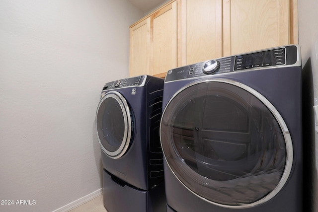 15072 W Mckinley St, Goodyear, AZ 85338 - laundry area with independent washer and dryer, cabinet space, and baseboards