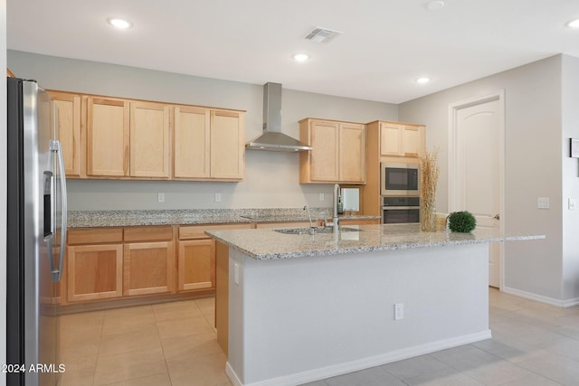 15072 W Mckinley St, Goodyear, AZ 85338 - kitchen featuring visible vents, appliances with stainless steel finishes, a sink, wall chimney range hood, and light brown cabinetry