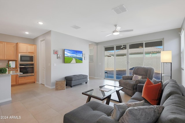 15072 W Mckinley St, Goodyear, AZ 85338 - living area featuring baseboards, ceiling fan, visible vents, and recessed lighting