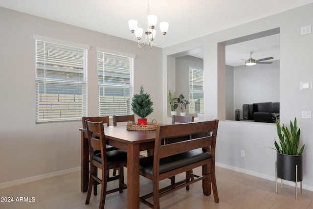 15072 W Mckinley St, Goodyear, AZ 85338 - dining area featuring baseboards and ceiling fan with notable chandelier
