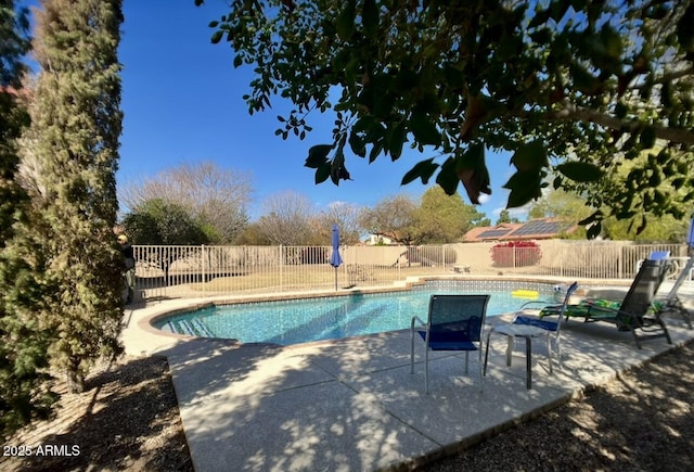 view of pool featuring a patio area, fence, and a fenced in pool