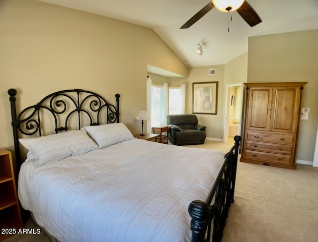 bedroom with visible vents, baseboards, light colored carpet, vaulted ceiling, and a ceiling fan