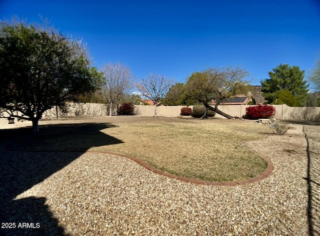 view of yard featuring a fenced backyard