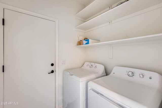 laundry room featuring laundry area and washing machine and dryer