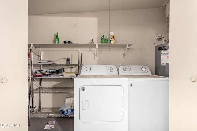 laundry room featuring gas water heater and washing machine and dryer