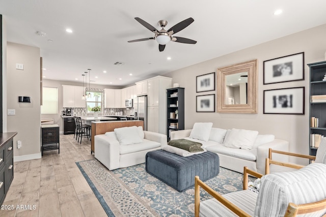 820 N 8th Ave Unit 14, Phoenix, AZ 85007 - living room featuring a ceiling fan, light wood-style floors, and recessed lighting