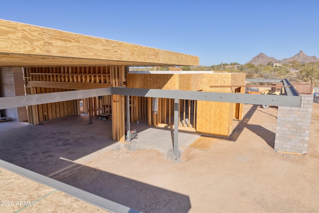 view of stable with a mountain view