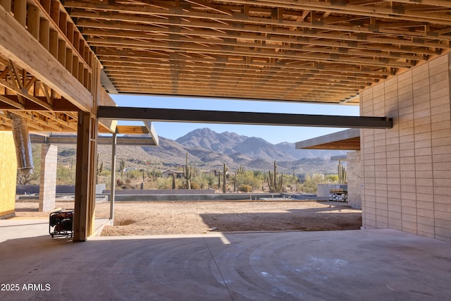 view of patio / terrace featuring a mountain view