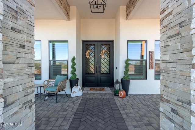 doorway to property featuring french doors