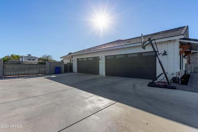 view of property exterior with a garage