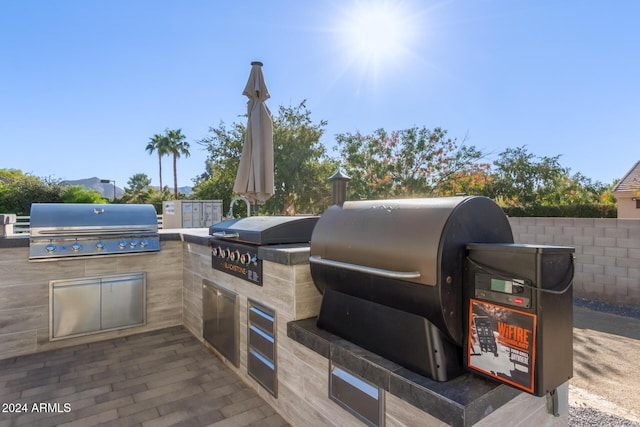 view of patio featuring area for grilling and grilling area