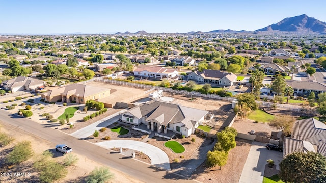 drone / aerial view featuring a mountain view