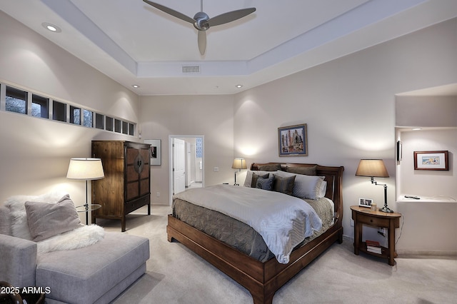 bedroom with baseboards, recessed lighting, visible vents, and light colored carpet