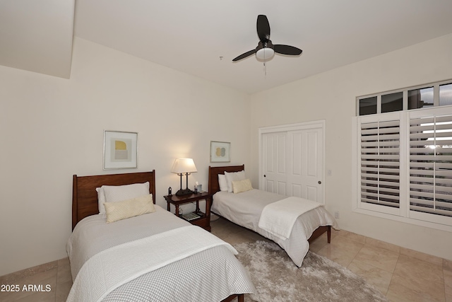 bedroom featuring a closet and ceiling fan