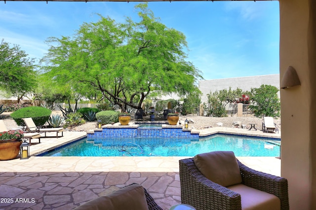 view of pool with a fenced backyard, a patio area, and a fenced in pool
