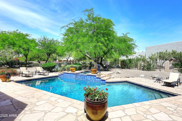 view of pool featuring a patio area, a fenced in pool, and fence