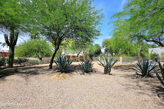 view of yard with fence