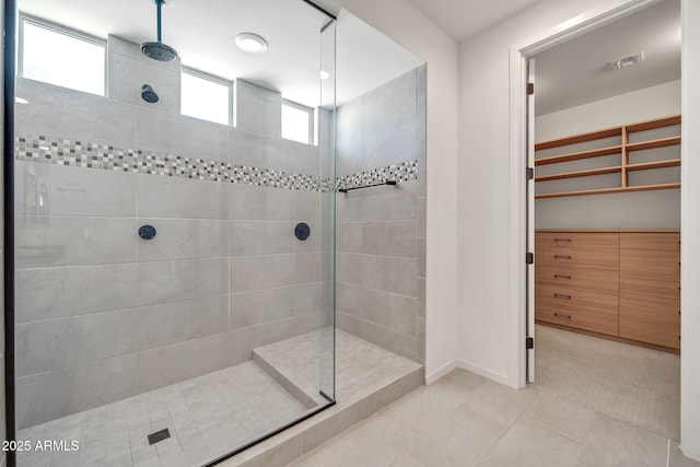 3417 E Los Gatos Dr, Phoenix, AZ 85050 - bathroom with a walk in shower and a walk in closet