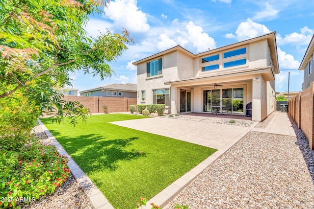 3417 E Los Gatos Dr, Phoenix, AZ 85050 - back of house with stucco siding, a ceiling fan, and a fenced backyard