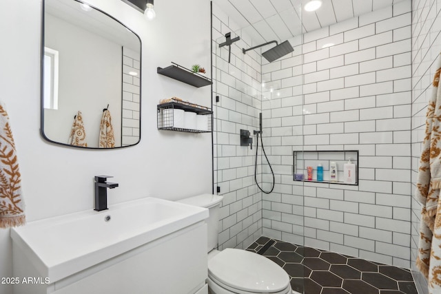 653 W Inglewood St, Mesa, AZ 85201 - full bathroom with vanity, toilet, and tiled shower