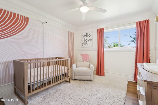 653 W Inglewood St, Mesa, AZ 85201 - bedroom featuring crown molding, a crib, ceiling fan, and baseboards