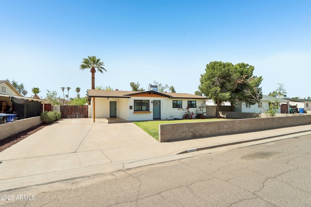 653 W Inglewood St, Mesa, AZ 85201 - ranch-style house featuring fence, a front yard, and concrete driveway