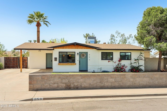 653 W Inglewood St, Mesa, AZ 85201 - view of front of house with fence and concrete driveway