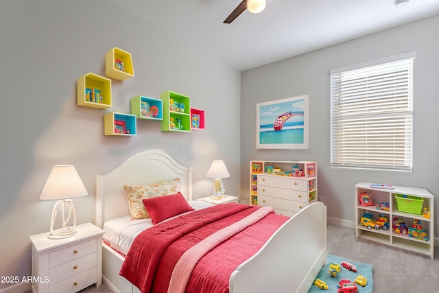 carpeted bedroom featuring ceiling fan