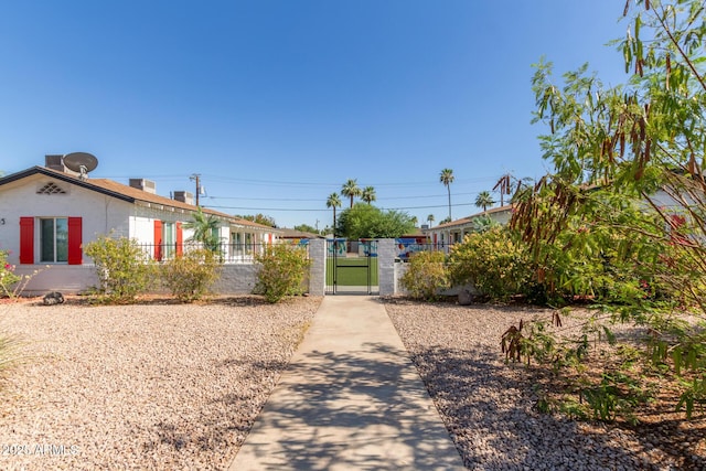 1605 W Osborn Rd, Phoenix, AZ 85015 - view of front facade with a gate and stucco siding