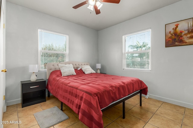1605 W Osborn Rd, Phoenix, AZ 85015 - bedroom featuring light tile patterned floors and ceiling fan