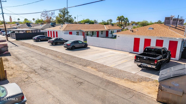 1605 W Osborn Rd, Phoenix, AZ 85015 - view of front facade with uncovered parking and a residential view