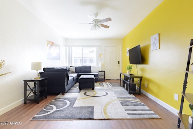 1605 W Osborn Rd, Phoenix, AZ 85015 - living area featuring a ceiling fan and wood finished floors