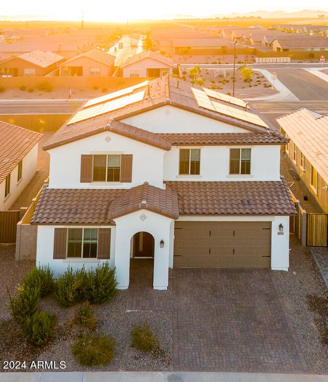 view of front of property featuring a garage