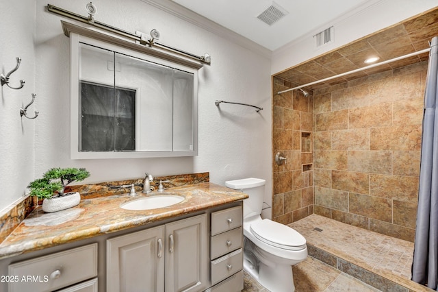 37801 N Cave Creek Rd Unit 13, Cave Creek, AZ 85331 - full bath featuring vanity, a tile shower, ornamental molding, and a textured wall