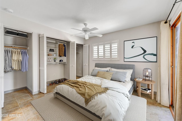 37801 N Cave Creek Rd Unit 13, Cave Creek, AZ 85331 - bedroom featuring multiple closets and a ceiling fan