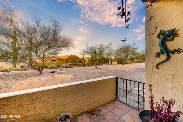 37801 N Cave Creek Rd Unit 13, Cave Creek, AZ 85331 - view of balcony at dusk