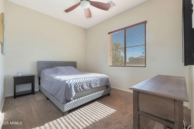 bedroom with dark carpet and ceiling fan