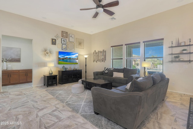 living room featuring ceiling fan