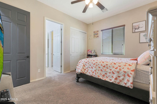 carpeted bedroom with ceiling fan