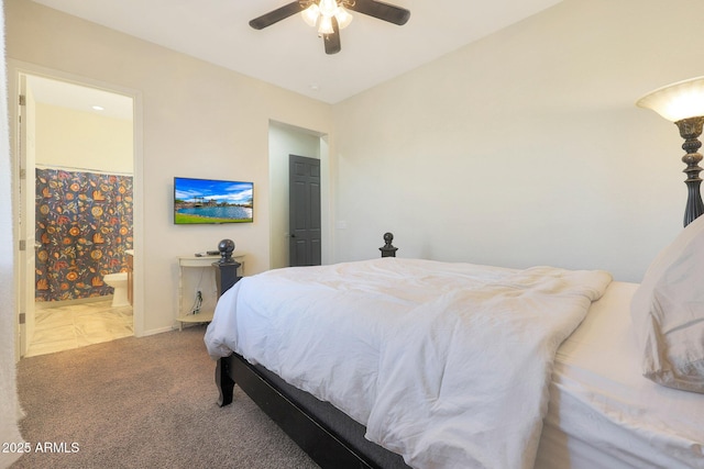 bedroom with ensuite bath, ceiling fan, a closet, and carpet